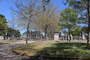 View of Pejoces Cemetery with tombstones and trees in Dijon