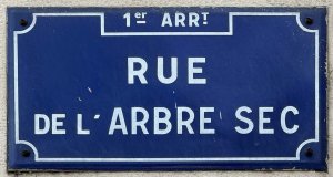 Street name plaque reading Rue de l'Arbre Sec in Lyon