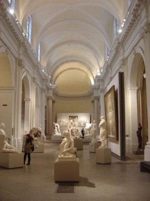 Interior view showcasing nineteenth-century sculptures at Palais Saint-Pierre