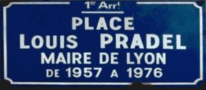 Street sign plaque showing the name Place Louis-Pradel in Lyon 1st arrondissement