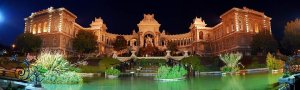 Illuminated Palais Longchamp at night in Marseille, panoramic view
