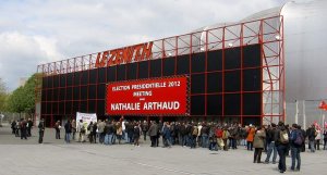 Exterior view of Zénith Paris concert hall during a Lutte Ouvrière political meeting