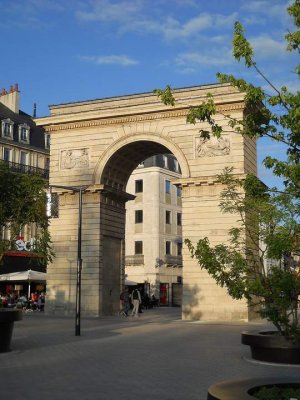 Ornate stone archway of Guillaume's Gate in Dijon, France