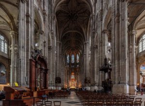 Interior view of the Church of Saint Eustache in Paris showing architectural details and seating