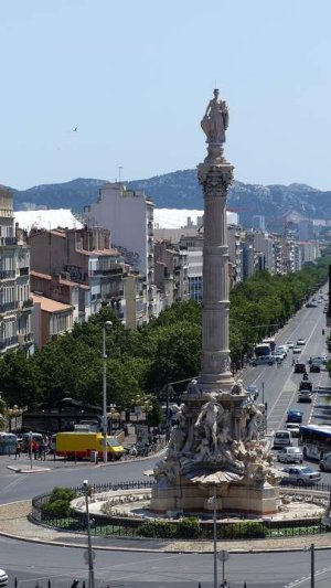 View of Place Castellane in Marseille featuring a central fountain and surrounding buildings