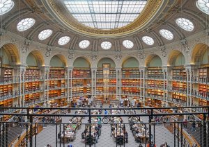 Oval reading room with classical architectural details and bookshelves at Richelieu site, Bibliothèque nationale de France