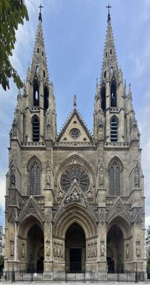 Front view of Basilica Sainte Clotilde in Paris under clear sky