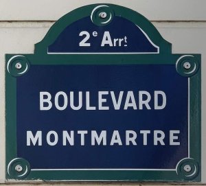 Street name sign reading Boulevard Montmartre in Paris