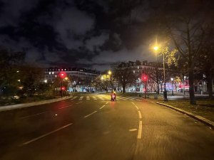 nighttime view of Place de la Nation square illuminated in Paris