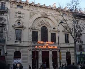Exterior view of Théâtre de la Porte-Saint-Martin with Michel Bouquet performing in Le Malade Imaginaire