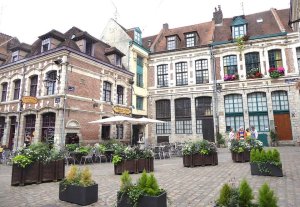 View of Place aux Oignons displaying urban public square and architecture