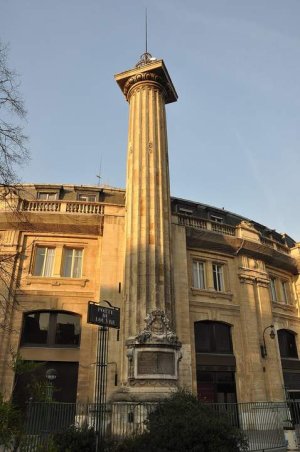 Ornate fountain at the base of Medici Column in Paris 4th district