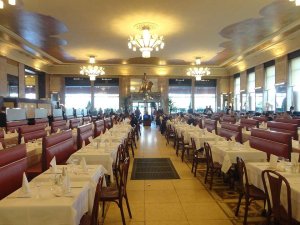 Spacious interior dining room of Brasserie Georges in Lyon featuring classic French brasserie decor