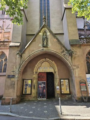 Entrance of Saint-Pierre-le-Jeune Protestant Church with its historic architectural details in Strasbourg