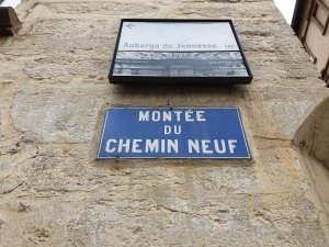 Plaque showing the name Montée du Chemin-Neuf street sign in Lyon