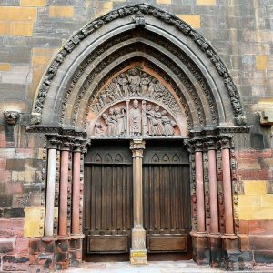 Gothic portal depicting Saint Nicholas and scenes of rescued children and final judgment at Saint Martin Church Colmar