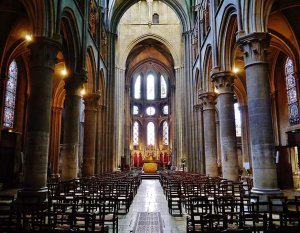 Nave interior of Church of Notre-Dame in Dijon with aisles and arches