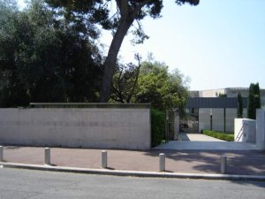 Entrance of the Musée Marc Chagall building in Nice with main doors and facade