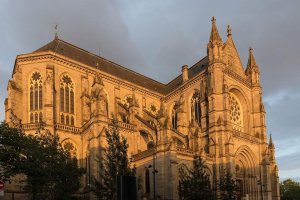 West facade of Notre-Dame de Bonne Nouvelle basilica in Rennes at sunset
