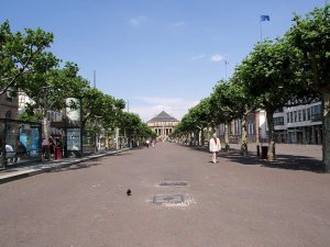 Wide view of Place Broglie square in Strasbourg with historic buildings and street activity