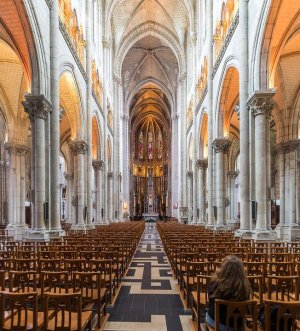 Interior view of the altar and decorated ceiling inside Basilique Saint-Nicolas in Nantes