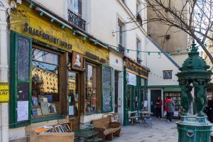 Exterior view of Shakespeare and Company bookshop in Paris with its distinctive storefront and signage