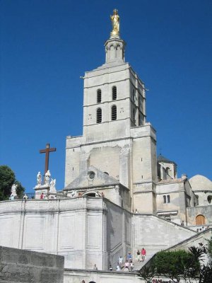Avignon Cathedral Notre-Dame-des-Doms with stone architecture and golden statue on roof