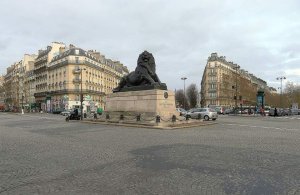 Denfert-Rochereau square featuring the replica of the Lion of Belfort monument in its center