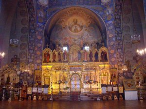 Interior view of the Russian Orthodox Cathedral in Nice featuring religious icons and ornate decoration