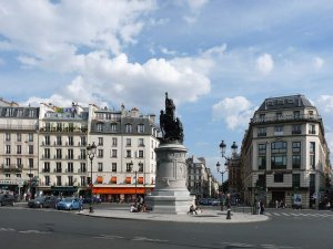 View of Place de Clichy in Paris from the north side showing urban street and buildings