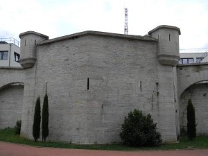 bastion of Montluc Fort in Lyon with stone walls and surrounding greenery