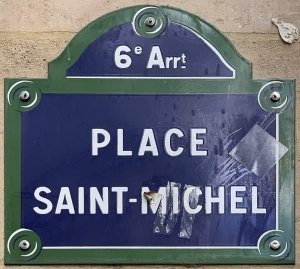 Street name plaque of Place Saint-Michel in Paris