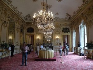 Elegant grand salon interior with ornate decorations and classic furnishings at Petit Luxembourg