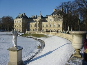 Formal garden landscape with manicured lawns and trees at Luxembourg Gardens in Paris