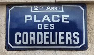 historic plaque sign displaying the name Place des Cordeliers in Lyon