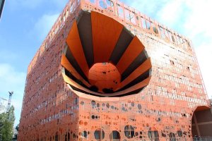 Orange Cube office building in Lyon, featuring modern architecture along the Quai Rambaud
