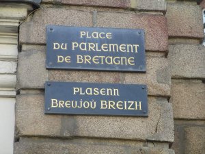 Street signs in French and Breton languages in Rennes showing Place du Parlement-de-Bretagne