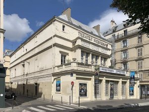Facade of Théâtre Hébertot in Paris showing its historic architecture and entrance