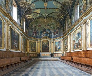 Interior view of Chapelle des Carmélites showing ornate altar and decorated ceiling