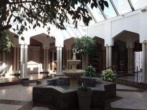 Interior atrium of the Grande Mosquée de Lyon with architectural details