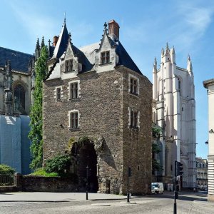 Stone arch entrance gate known as Porte Saint-Pierre located at Maréchal-Foch square in Nantes, France