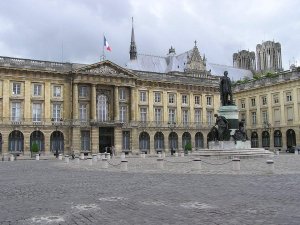 Statue of Louis XV at Place Royale with Notre Dame Cathedral in the background