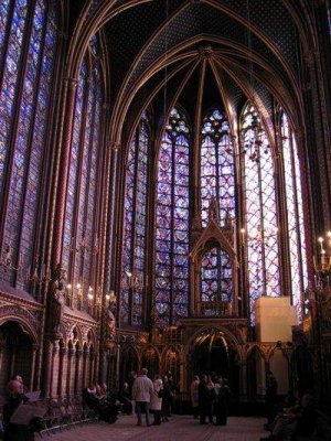 Intricate stained glass windows and gothic interior of Sainte Chapelle in Paris