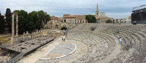 Aerial panoramic view of the Gallo-Roman theatre at Arles showing ancient stone structure and seating area