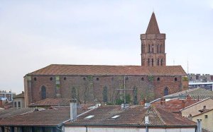 Front view of Saint Nicolas Church in Toulouse showing gothic architectural details