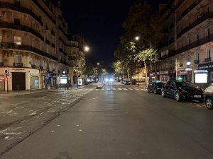 nighttime view of Boulevard Saint-Germain illuminated with street lights in Paris
