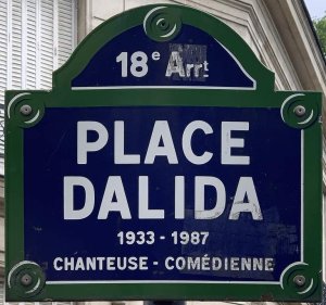 Street sign plaque for Place Dalida in Paris eighteenth arrondissement