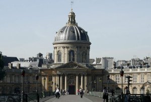 Institut de France building housing Académie des Beaux-Arts with Pont des Arts bridge in foreground