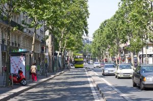 Wide view of Boulevard Saint-Germain street in Paris with buildings and urban surroundings
