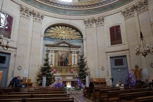 Interior view of Notre-Dame-de-l'Assomption church in Paris showing architectural and decorative details
